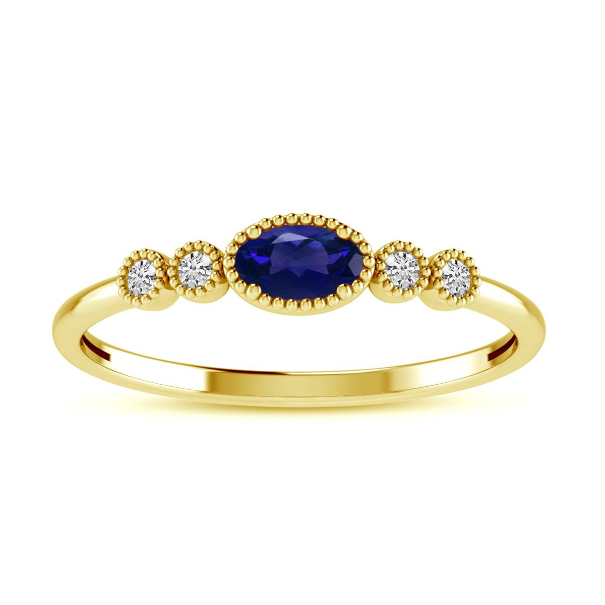 YELLOW GOLD RING WITH OVAL SAPPHIRE AND ROUND CUT DIAMONDS, .06 CT TW