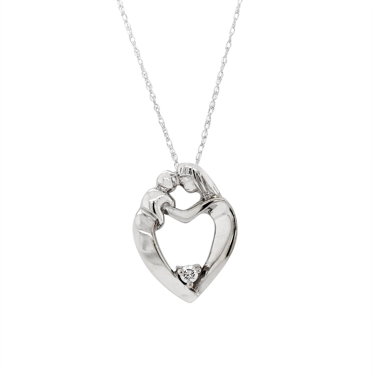 WHITE GOLD MOM AND CHILD HEART PENDANT WITH .05 CARAT DIAMOND
