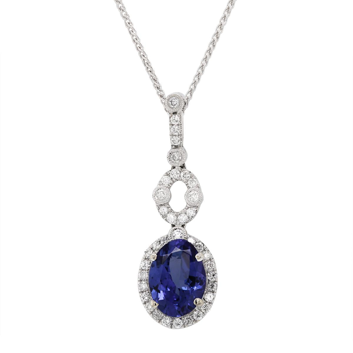 WHITE GOLD OVAL TANZANITE AND DIAMOND PENDANT, 3/4 CT TW
