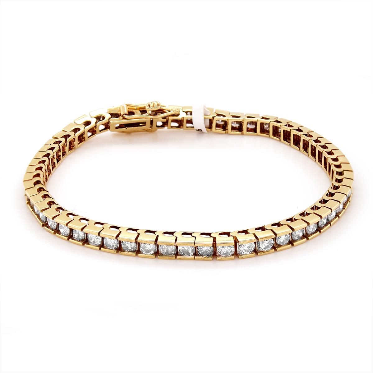 YELLOW GOLD TENNIS BRACELET WITH 56 DIAMONDS, 6.00 CT TW