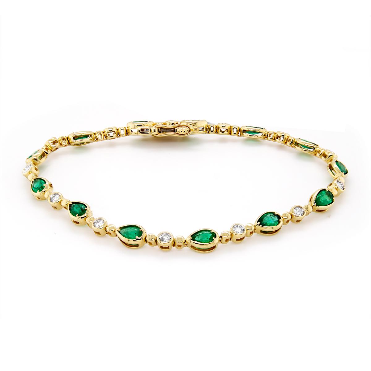 YELLOW GOLD PEAR EMERALD AND ROUND DIAMOND BRACELET, .39 CT TW