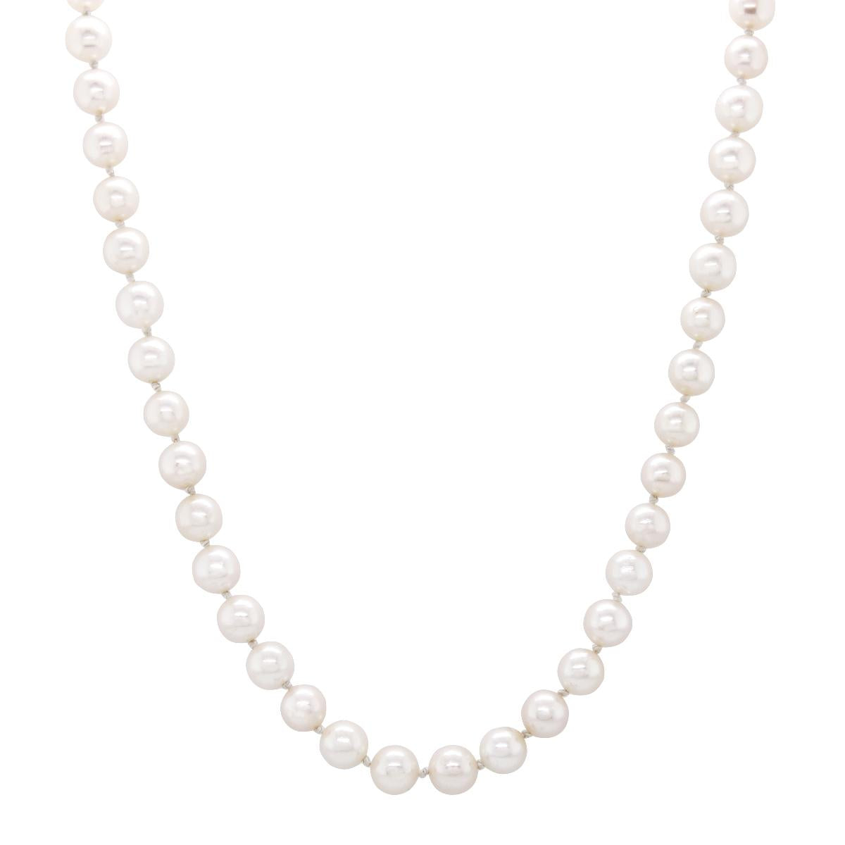 62 PEARL STRAND NECKLACE WITH YELLOW GOLD CLASP