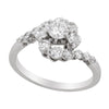 WHITE GOLD BYPASS STYLE ENGAGEMENT RING WITH .36 CARAT ROUND DIAMOND CENTER, .75 CT TW