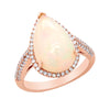 ROSE GOLD FASHION RING WITH PEAR SHAPED OPAL AND SIDE DIAMONDS, .48 CTTW