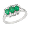WHITE GOLD FASHION RING WITH THREE OVAL CUT EMERALDS AND DIAMONDS, .52 CT TW