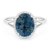 WHITE GOLD FASHION RING WITH OVAL CUT LONDON BLUE TOPAZ, .10 CT TW