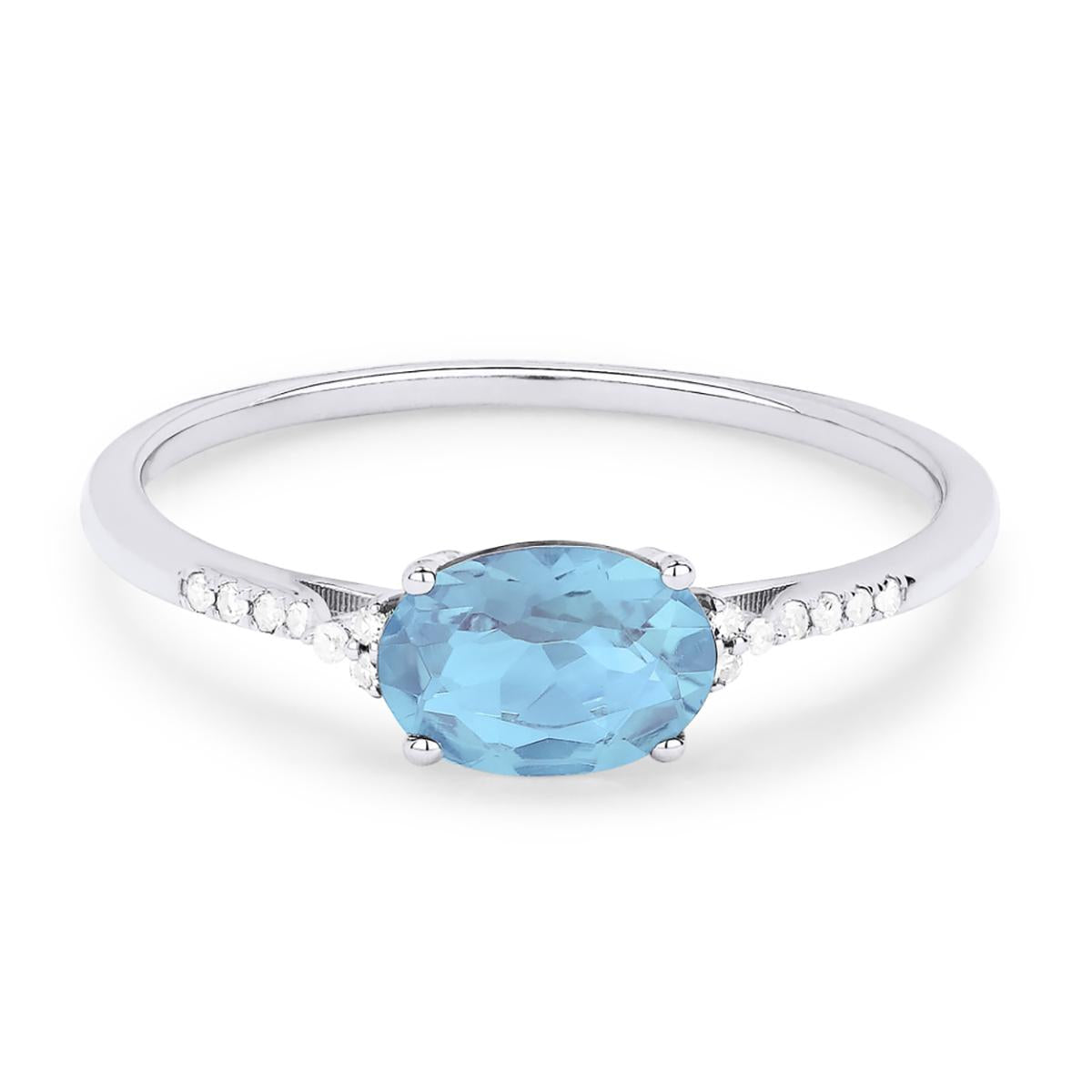 CLASSIC WHITE GOLD FASHION RING WITH AN OVAL CUT BLUE TOPAZ, .04 CT TW