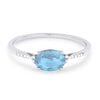 CLASSIC WHITE GOLD FASHION RING WITH AN OVAL CUT BLUE TOPAZ, .04 CT TW