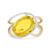 YELLOW GOLD AND OVAL CUT CITRINE STATEMENT RING, .13 CT TW
