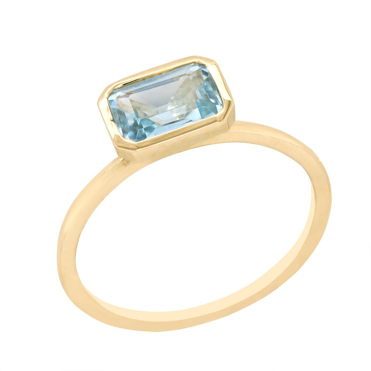 YELLOW GOLD FASHION RING WITH EMERALD CUT BLUE TOPAZ