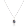 WHITE GOLD PENDANT NECKLACE WITH BLUE ENHANCED OVAL DIAMOND