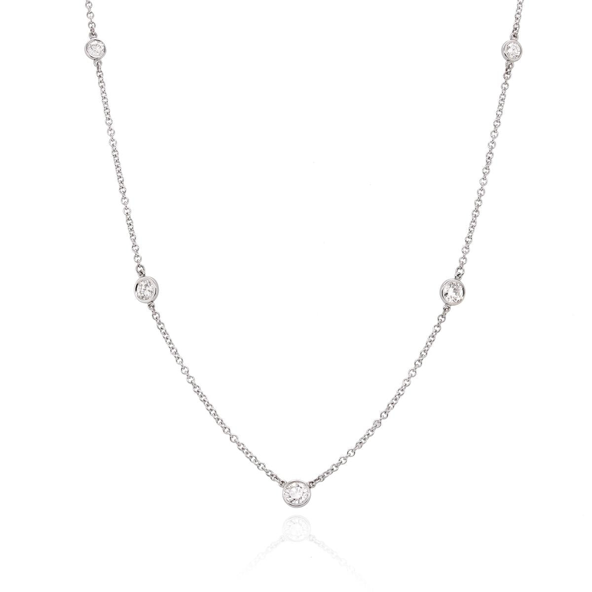 WHITE GOLD NECKLACE WITH 9 ROUND CUT DIAMONDS, 1.46 CT TW