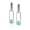 MODERN WHITE GOLD DANGLE EARRINGS WITH EMERALD CUT BLUE TOPAZ AND DIAMONDS, .37 CT TW