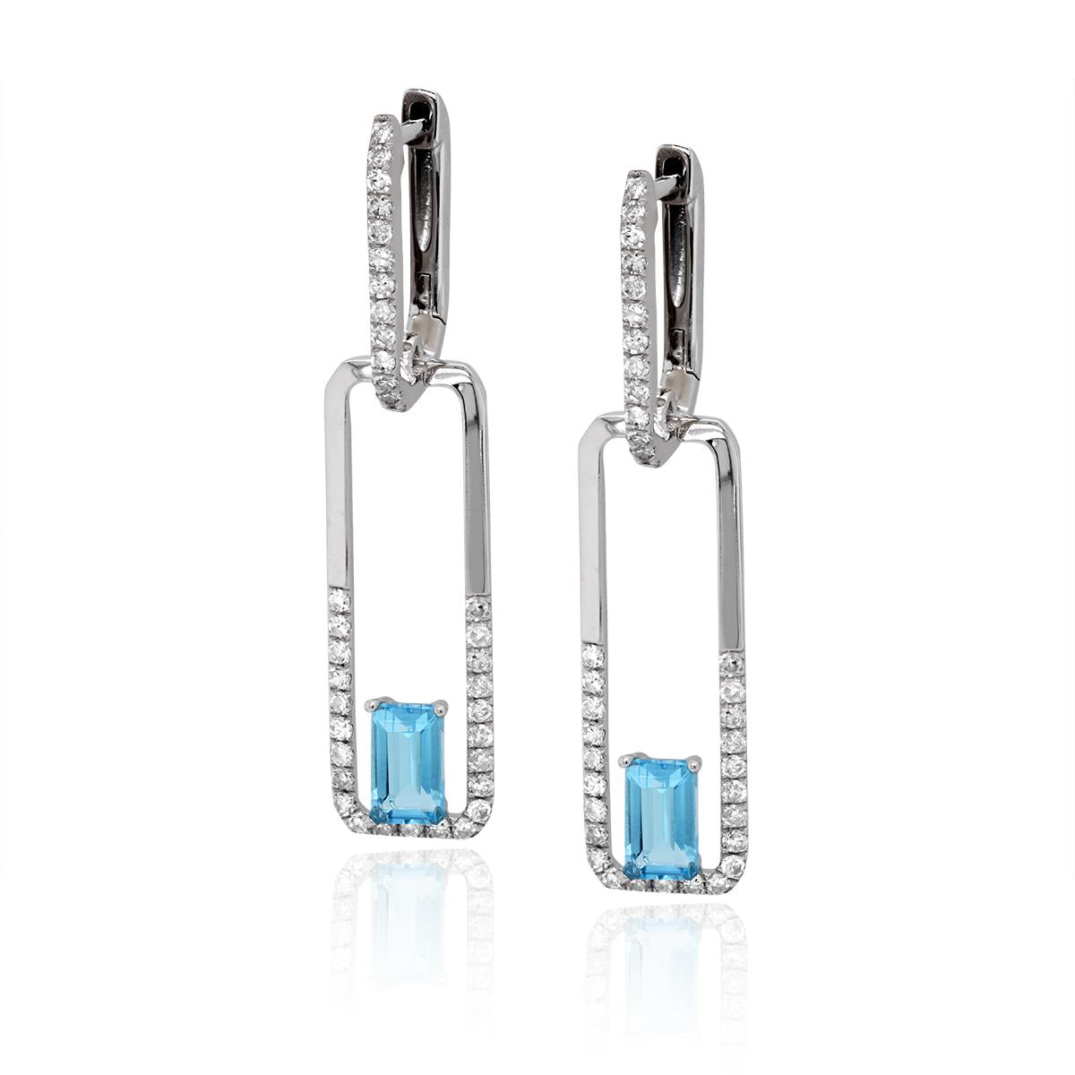 MODERN WHITE GOLD DANGLE EARRINGS WITH EMERALD CUT BLUE TOPAZ AND DIAMONDS .37 CT TW