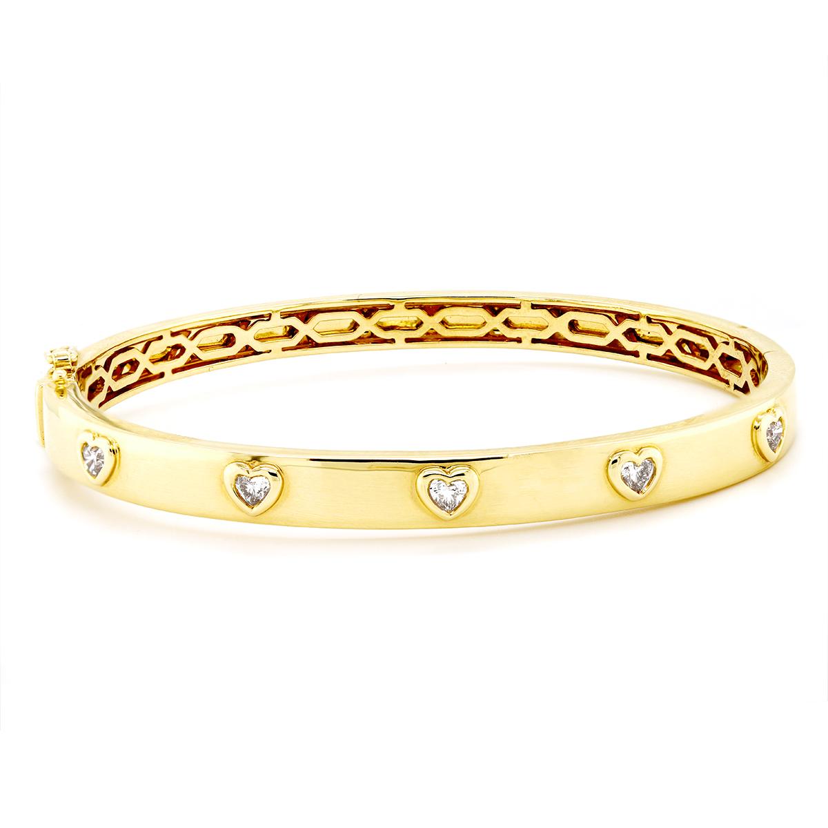 YELLOW GOLD BANGLE BRACELET WITH HEART SHAPED DIAMONDS, .53 CT TW